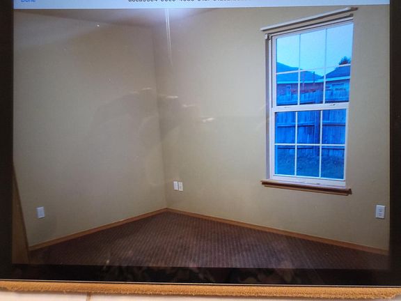 Partial view of master bedroom.