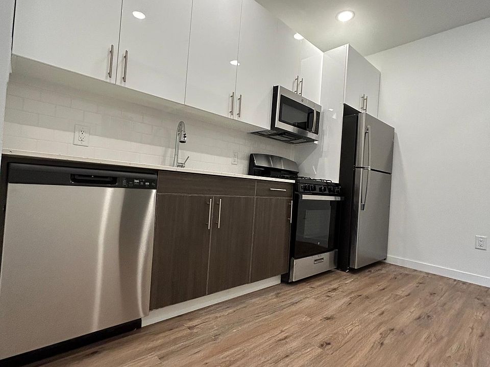 Beautifully rennovated kitchen with brand NEW stainless steel appliances