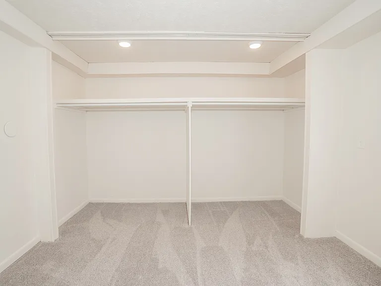 Second Bedroom with Built In Open Closet Storage