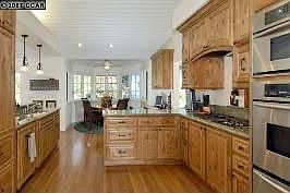 New kitchen with distressed alder cabinetry