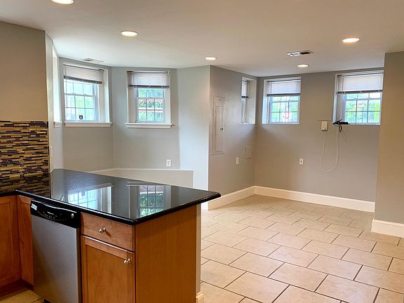 View from open kitchen of some of the dining and living room areas.