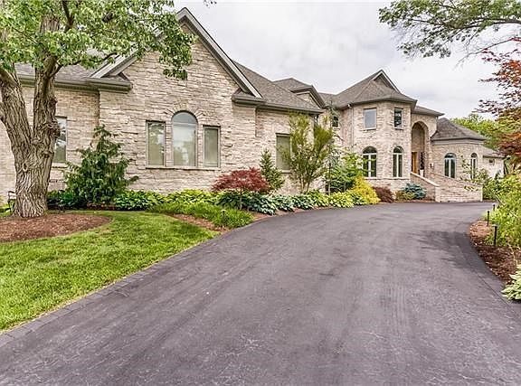 Circle driveway is the perfect place for friends to park.