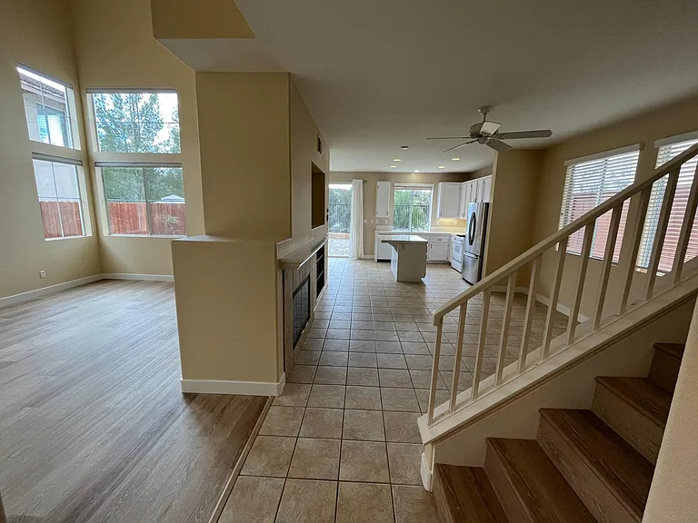 View of open floor plan as you enter from garage