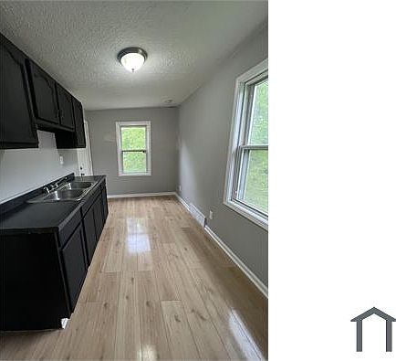2nd image of 5813 Lansing Ave #Up