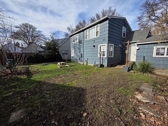 Backyard, partially fenced
