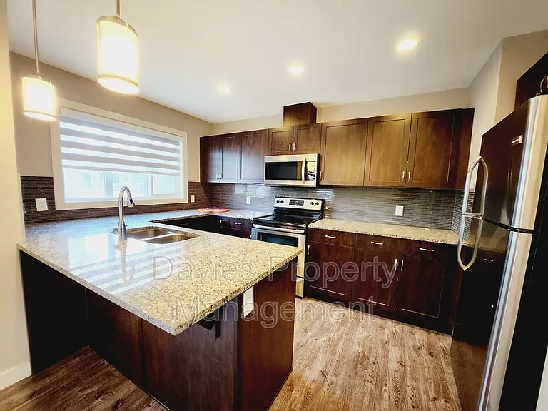 140 Youville Drive East NW #NW-13-13 — Photo 3