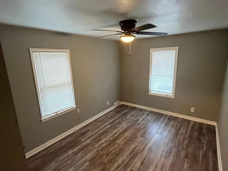 north facing bedroom;
vinyl plank flooring;
ceiling fan