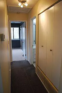 Lobby with built in wall closet