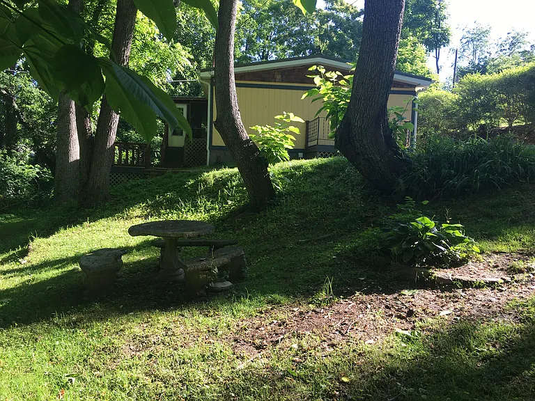 down by the stream, stone picnic table, private area