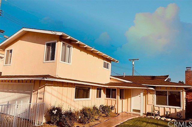 Move in ready 4 bedroom plus den home in great Lomita location. One full bath and one 3/4 bath on ground floor. 1/2 bath attached to upstairs bedroom and another 1/2 bath in the garage.