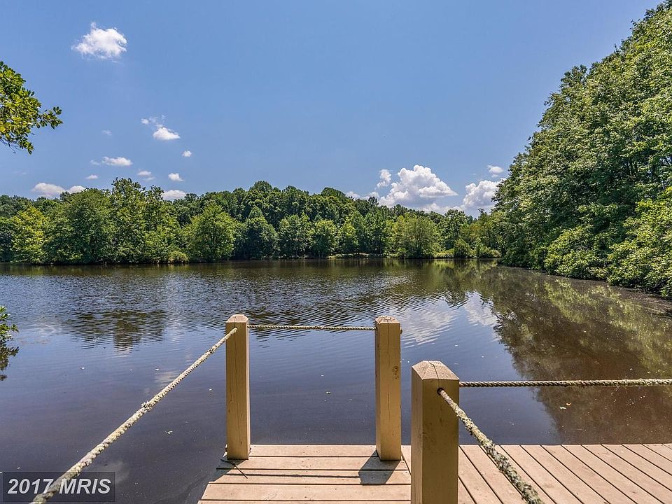 GORGEOUS lake front home w/ 5 acres, COME SEE!