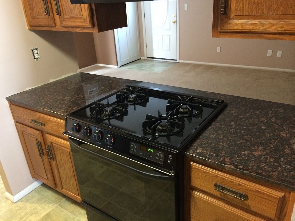 gas range with granite countertops