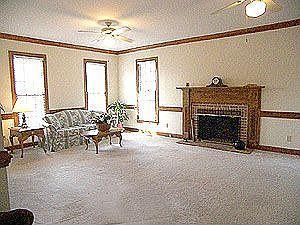 SPACIOUS FAMILY ROOM W/ WOOD BURNING FIREPLACE