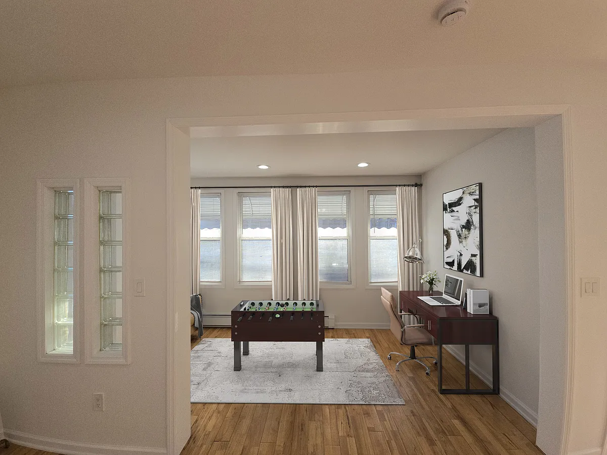 Front Foyer. Can be used as a gameroom, office, additional family room. - Logan Ave