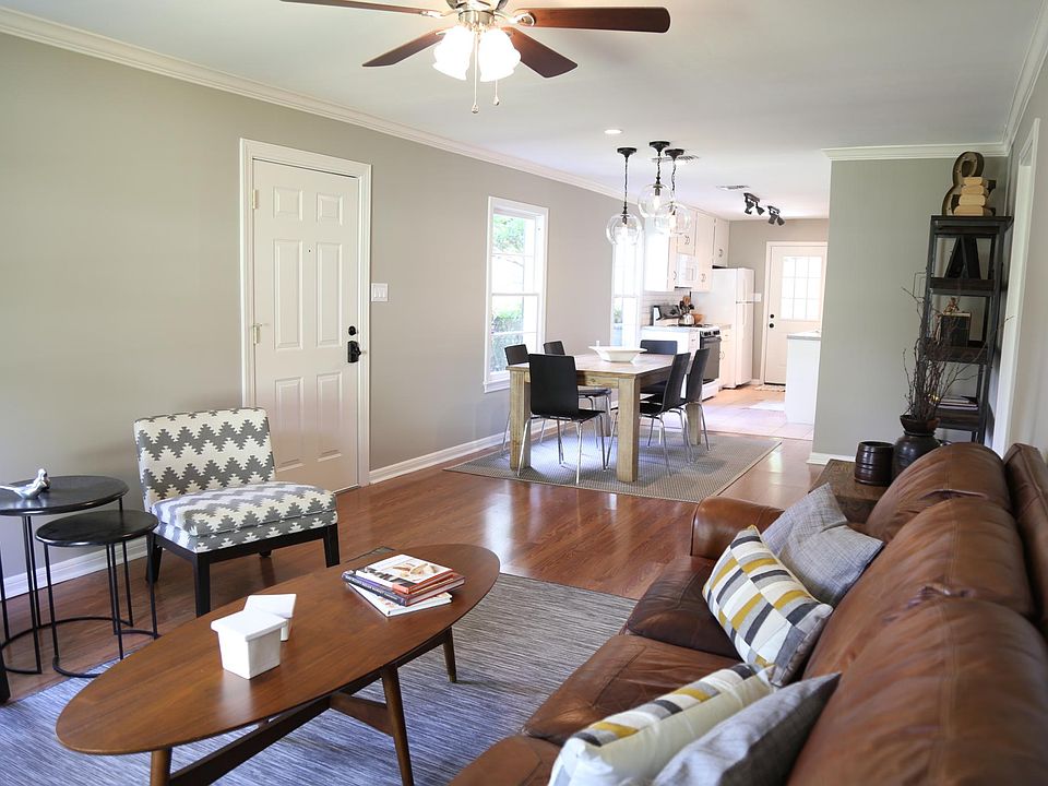 Living, Dining, and Kitchen rooms create the front half of the home. (furniture not included)