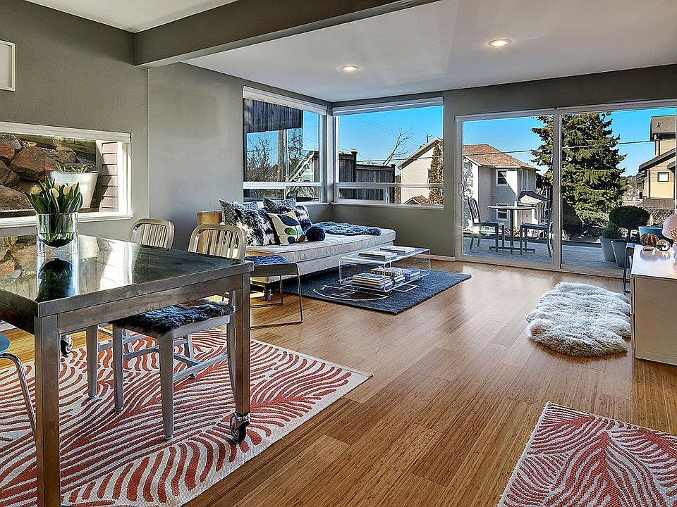 From eat in looking through living room and outside. Bamboo flooring.