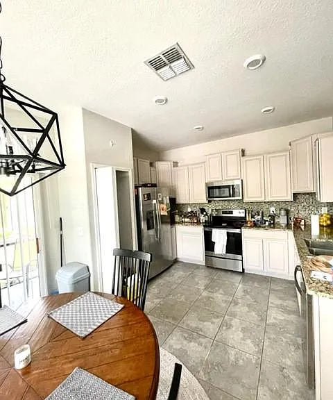 1702 Ivory Goose Pl — Photo 7