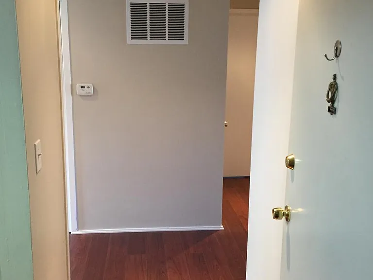 Standing in front door