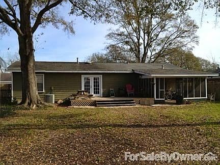 Fenced Yard with deck and screened porch.