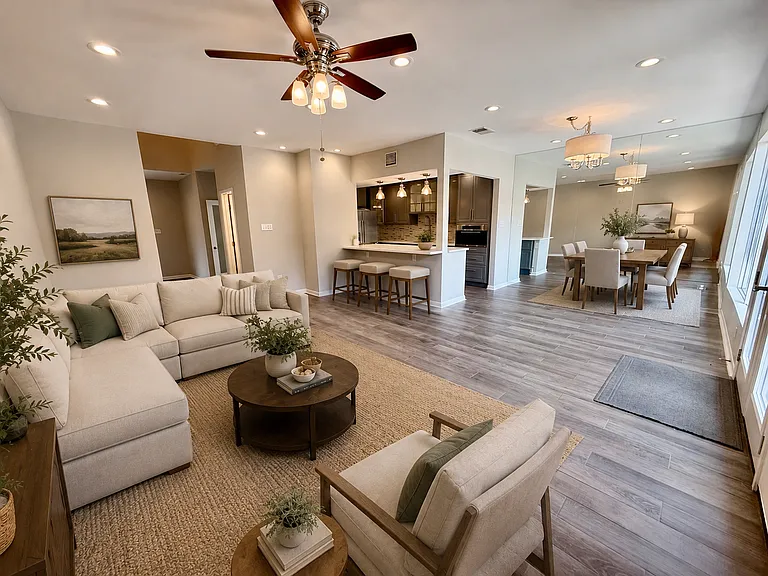 Open concept kitchen, Den, dining room Looks out over the private Breezeway.
Virtually Staged