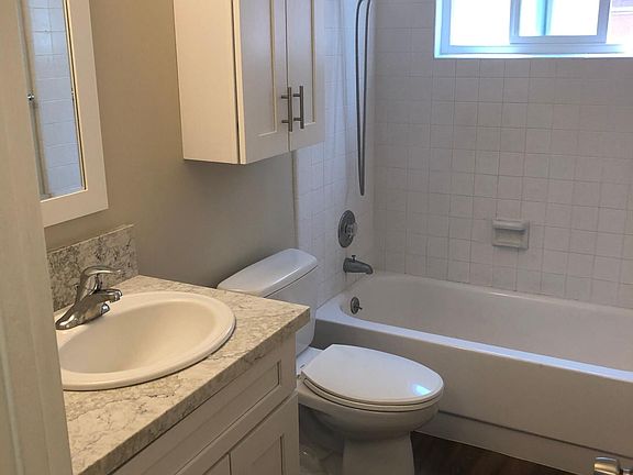 New vanity, new quartz countertops, new lighting, new fixtures and toilet.