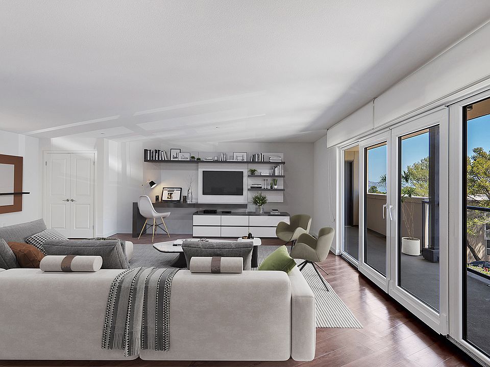 Spacious living rooms complete with hardwood flooring throughout and large patio doors that provide indoor outdoor living space