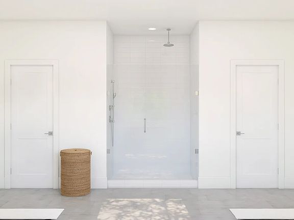 Primary bath with glass shower enclosure