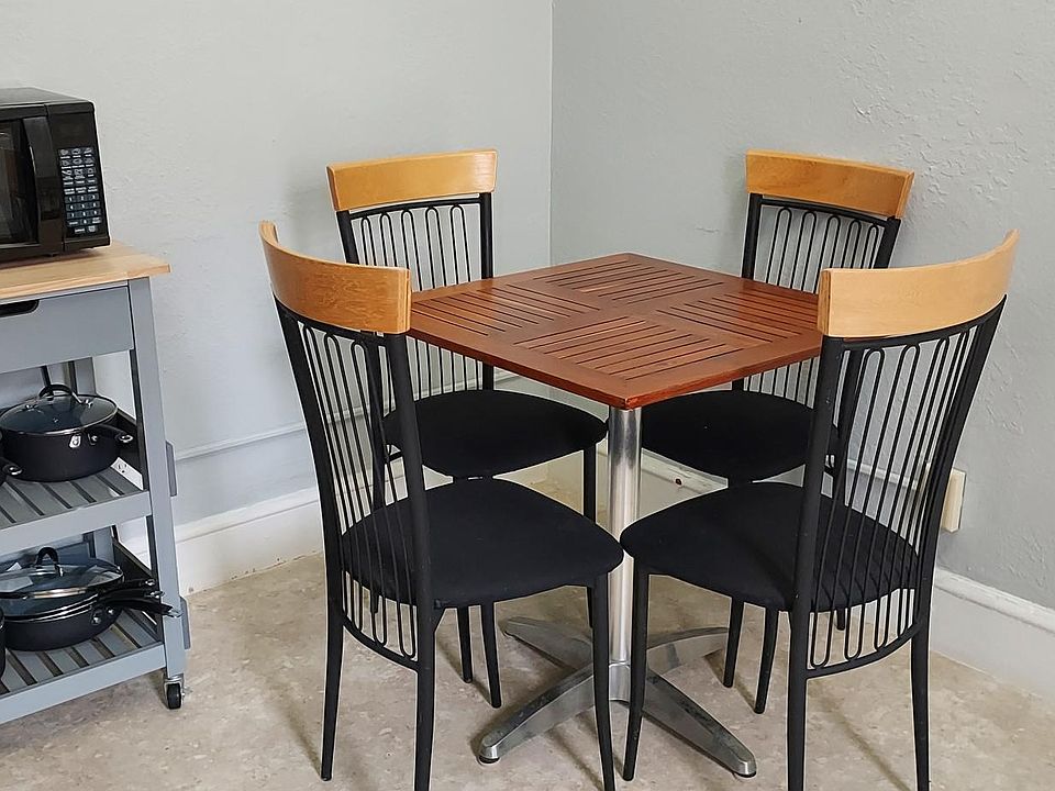 A table will fit in the kitchen area. There is also a second closet for extra storage.