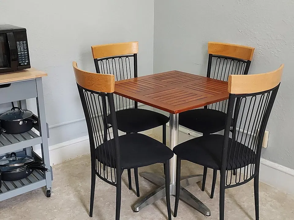 A table will fit in the kitchen area. There is also a second closet for extra storage.