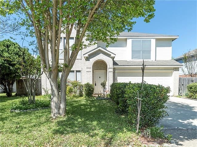 Great 2 story  w matured landscaping. Can Hardly see this lovely brick home for all the trees.
