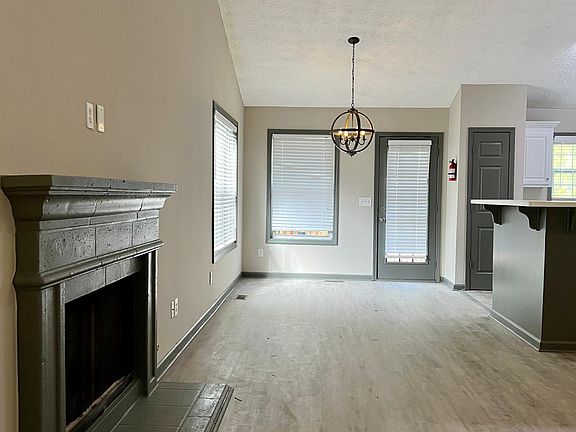 Open floor plan living, dining and kitchen