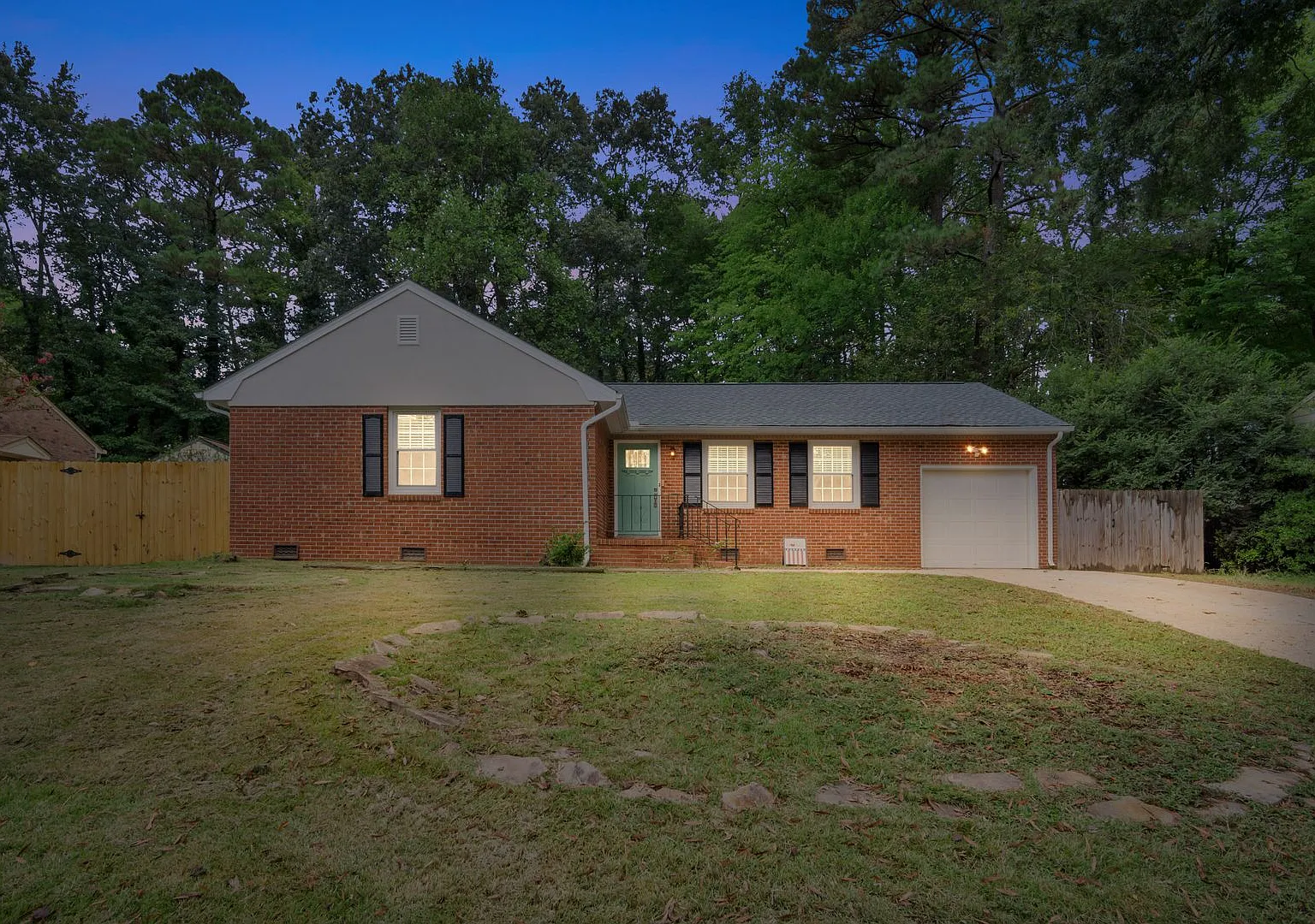 Fully Updated Brick Rancher with Huge Fenced Yard Walk to Outlets! — Photo 4