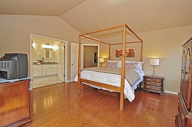 Spacious master suite with double entry doors
