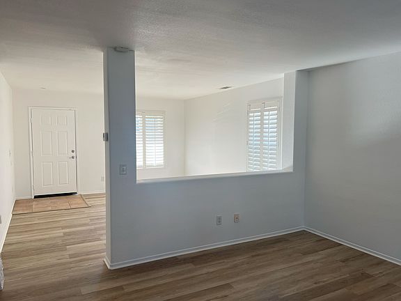 Entry door and living and family room
