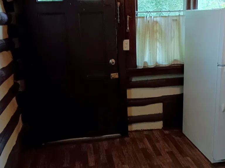Front door from bottom of stairs.