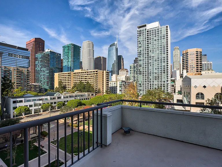 Take in the spectacular city views from your private balcony