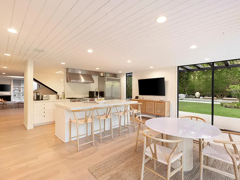 Kitchenette with seating and counter stools
