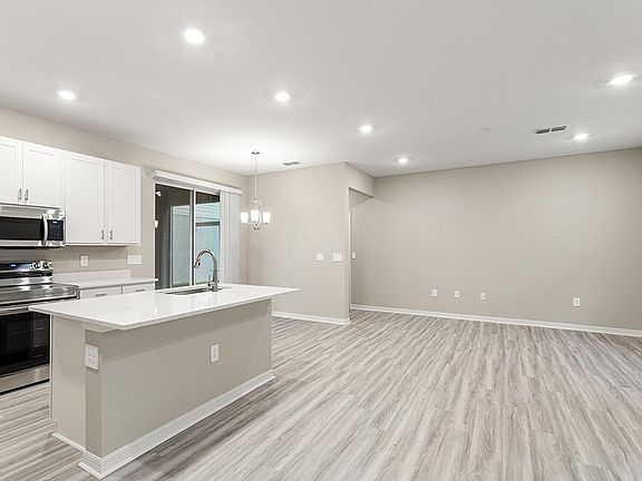 Enjoy a spacious, open living area with LVP flooring.