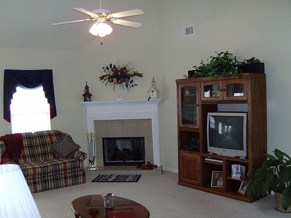 vaulted ceiling, corner fireplace