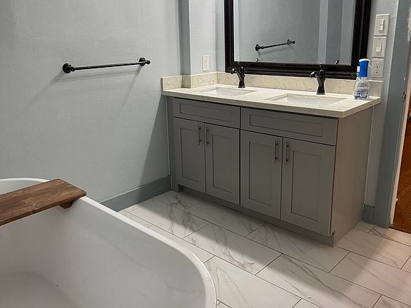 Large bathroom with soaking tub and separate shower