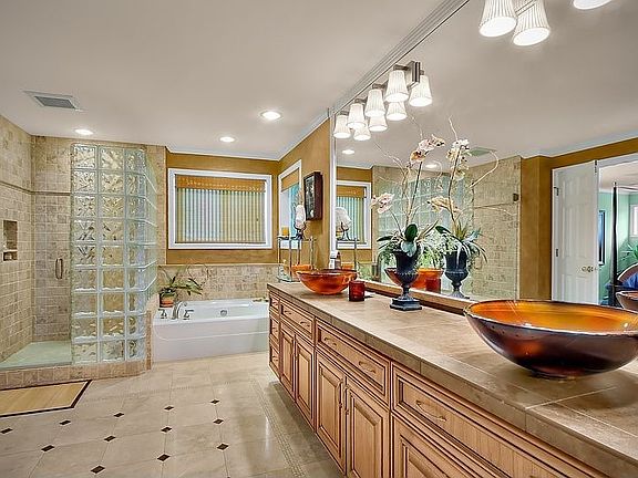 Master bath with heated marble floors and 