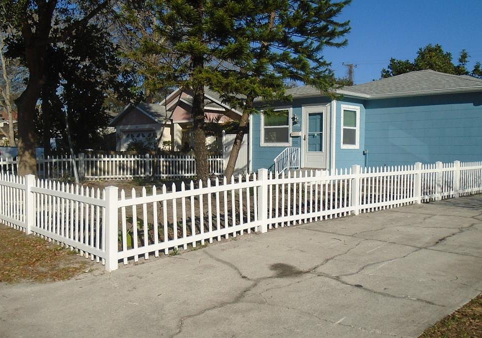 Front - White Fence/Driveway/Carport