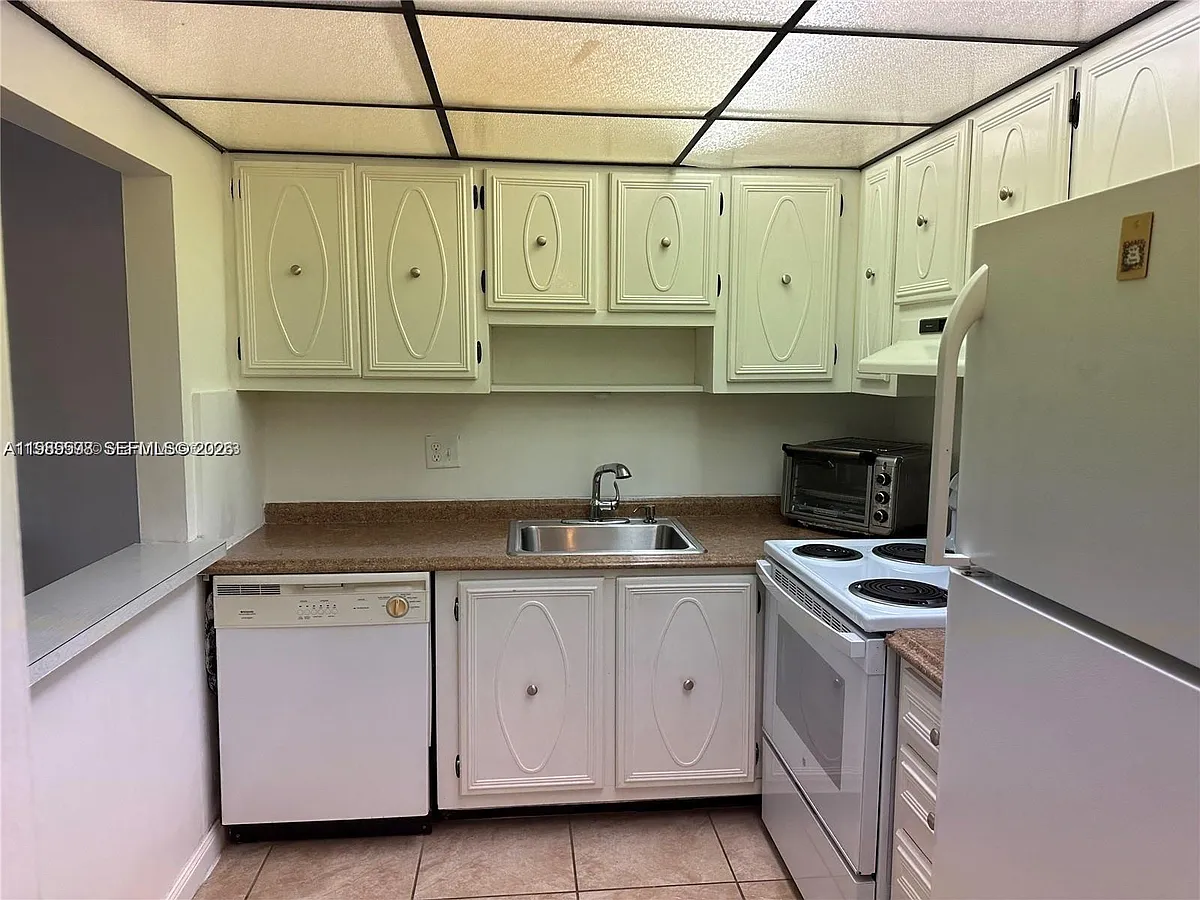 Photo 2 of 24 - 253 S Cypress Rd #214 - Pompano Beach, FL Building Photo - 253 S Cypress Rd #214