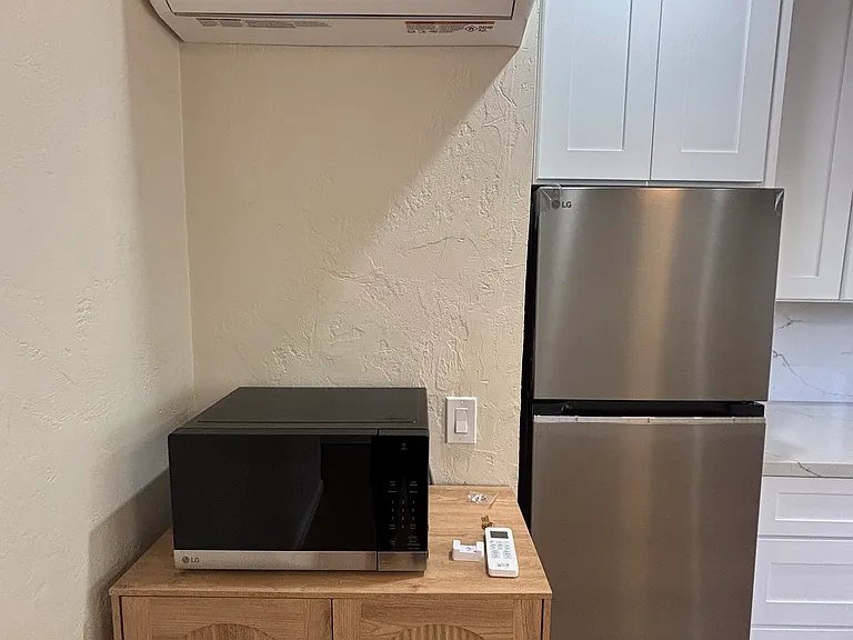 New AC and Heat Unit with Remote Control