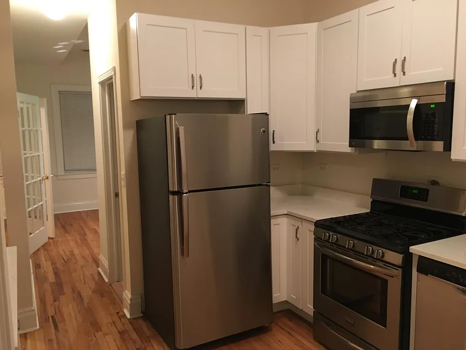 Stainless appliances open kitchen