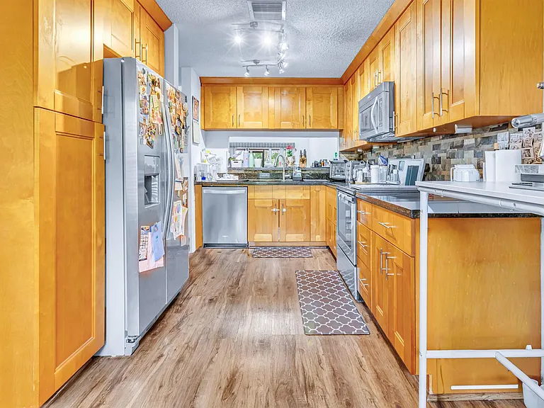 7610 Pinewalk Dr S #128 — Photo 9