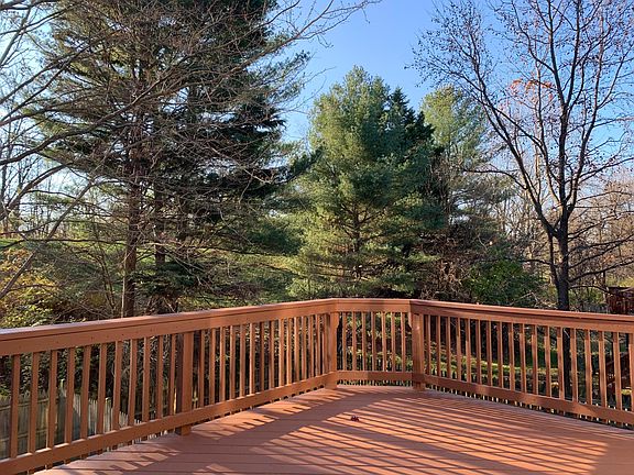 Deck overlooking open green space