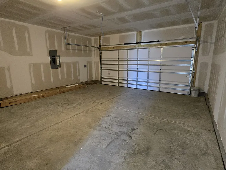 Off street parking in driveway or in the 2 car garage