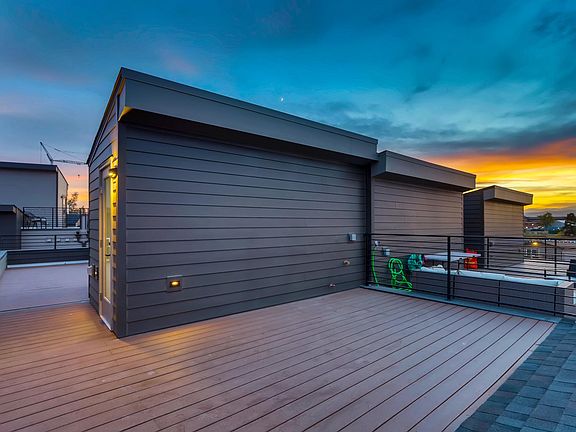Two rooftop decks with amazing views of the mountains. Right inside the door will be a bar sink and mini fridge.