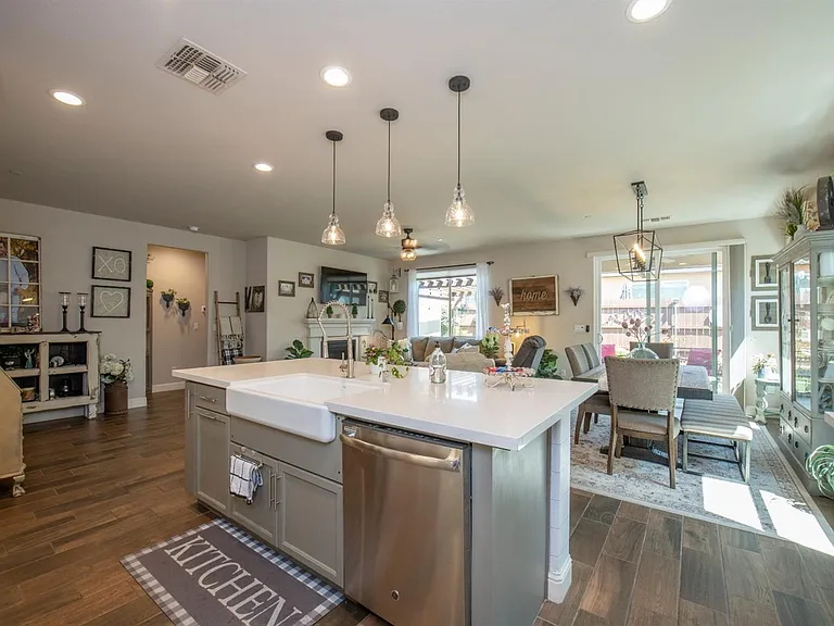 Kitchen with Quartz Countertop Island and Farm Sink
